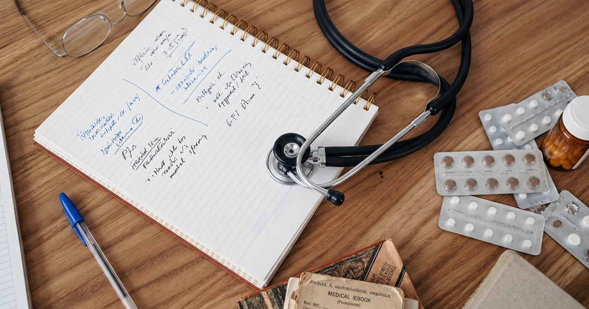 Doctor writing notes, illustrating medical records used in a California mesothelioma lawsuit